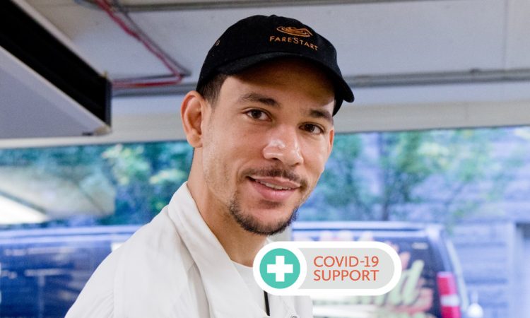 A man wearing a black hat and white shirt looks at the camera. Text overlay says "COVID-19 SUPPORT"