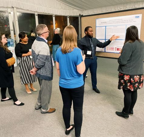 A teacher presents his research at the 2023 Partners in Science National Conference