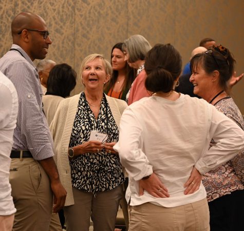 A group of individuals at the Murdock Trust Board Leadership conference have a conversation