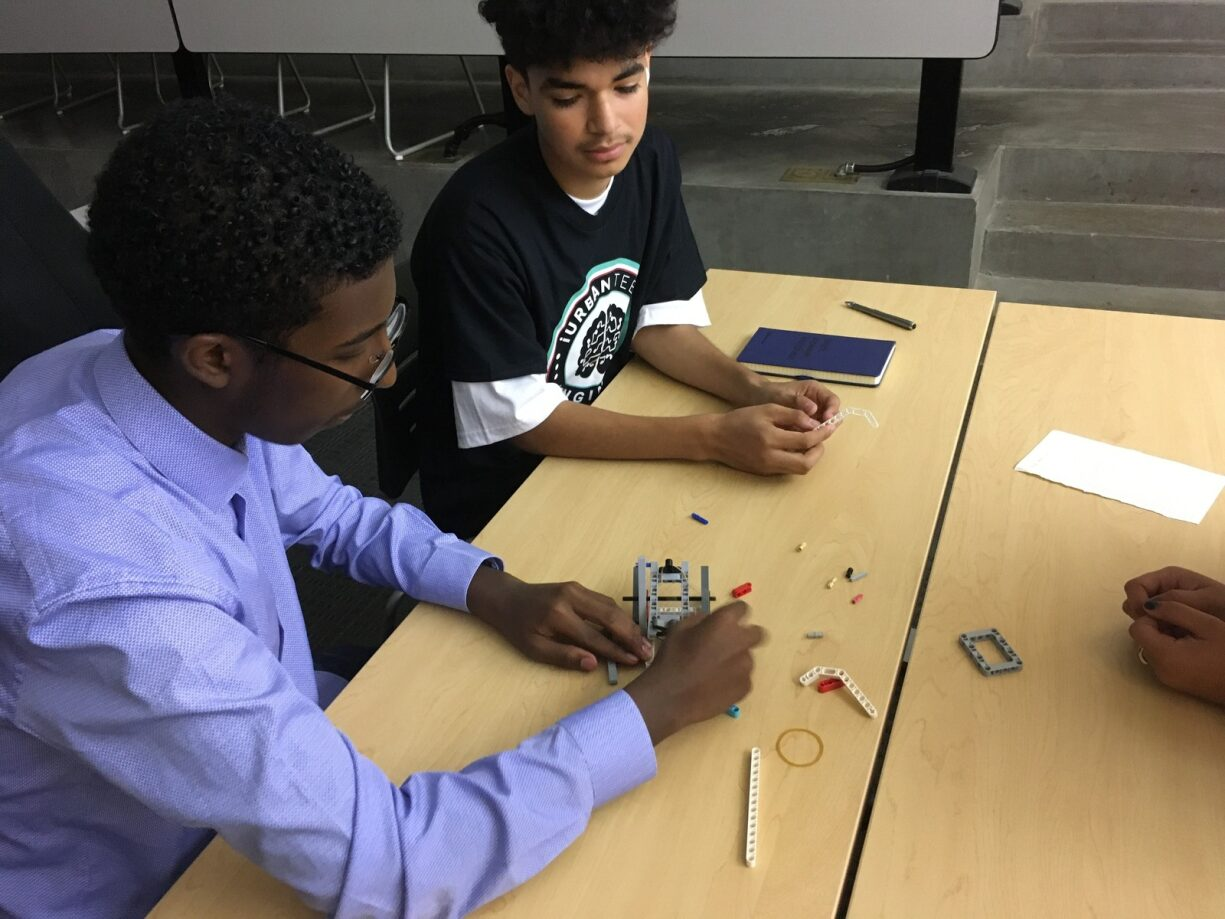 Two male students working on a STEM project together 