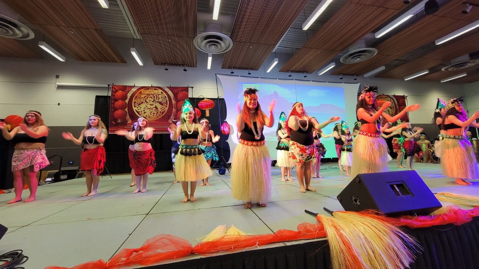 Female tahitian dancers on stage 
