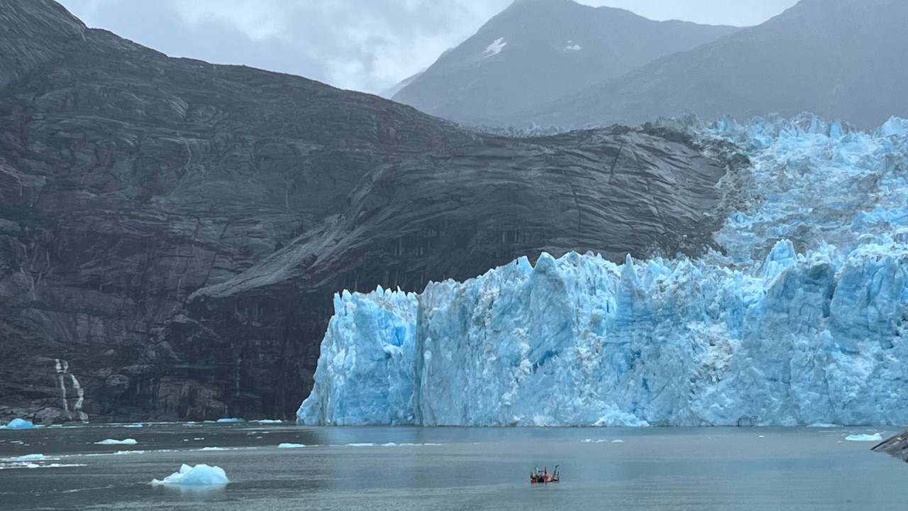 water and glaciers with darker skies