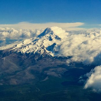 An overhead shot of Mt Hood, a mountain peak covered in snow.