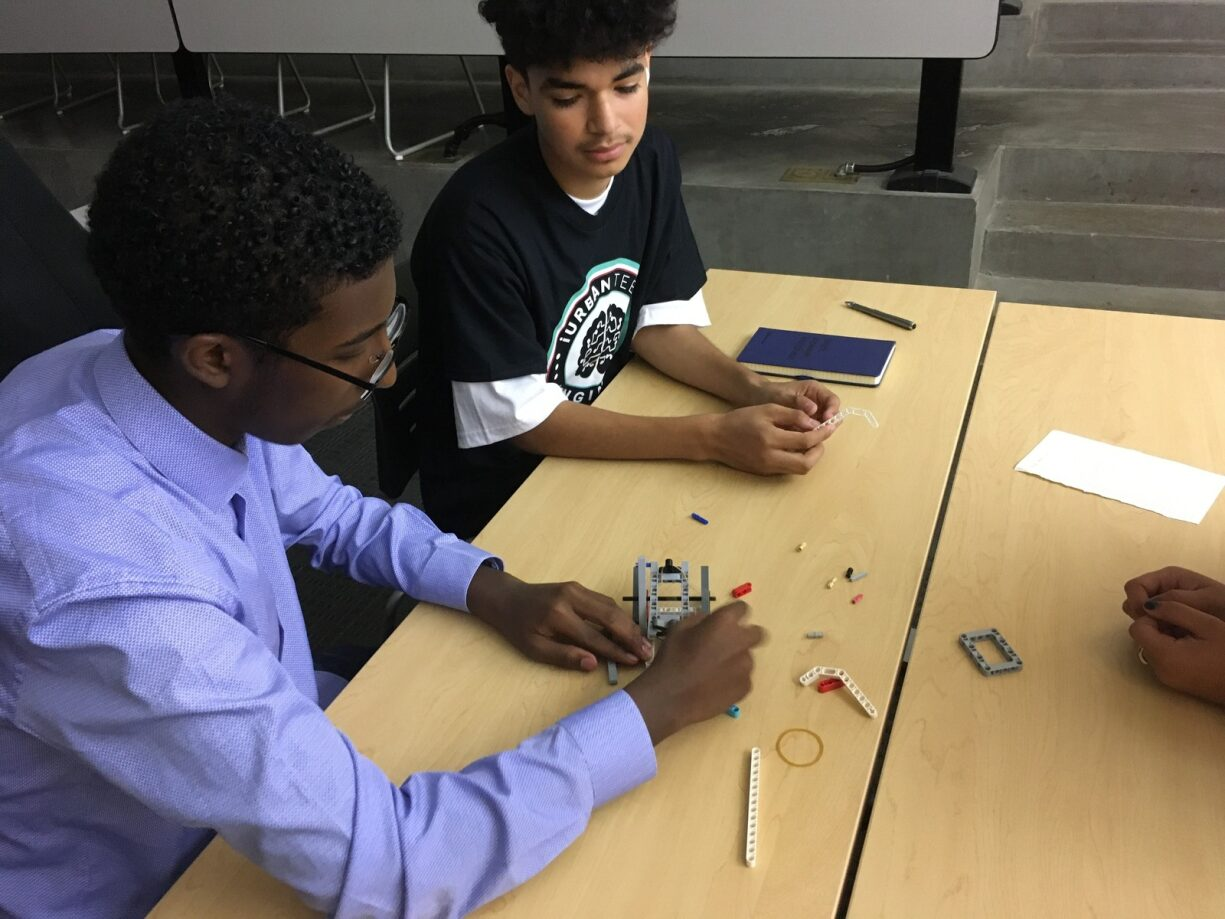 Two male students working on a STEM project together