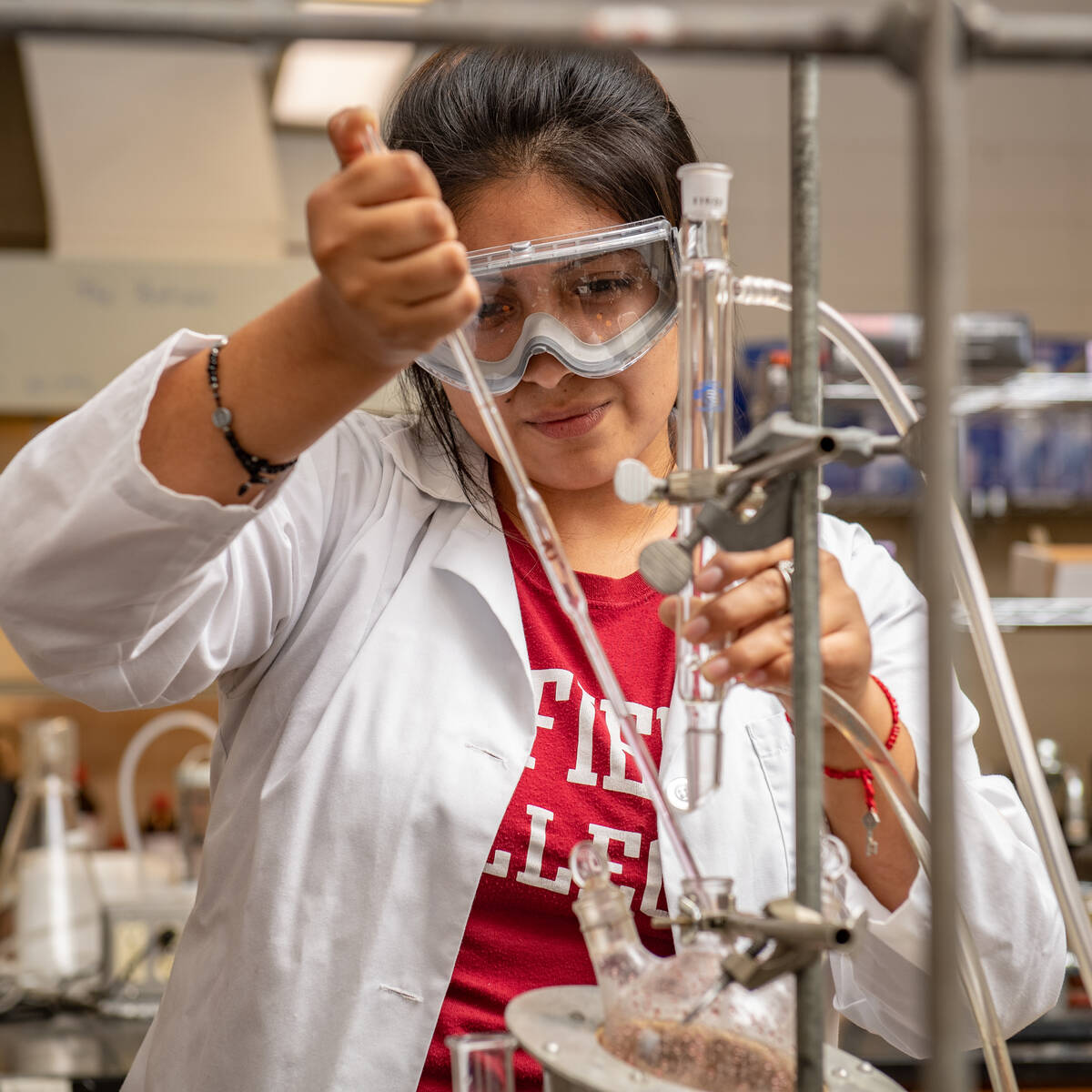 Linfield University student conducting chemistry experiments