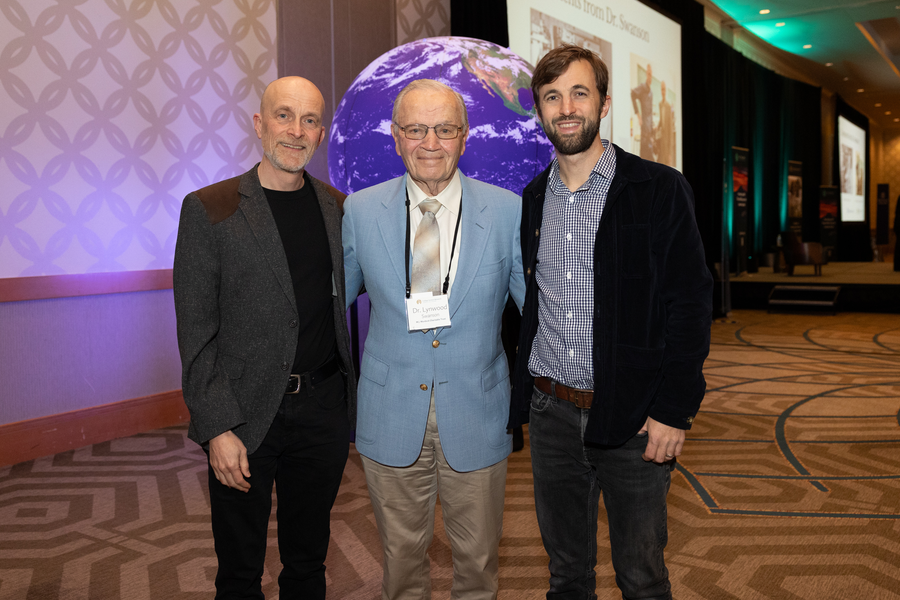 Two 2024 Swanson Scientific Research Award winners with Lyn Swanson standing between them